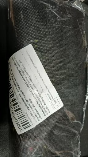 Producto gris dentro de su empaque, foto adjunta a una reseña de AliExpress